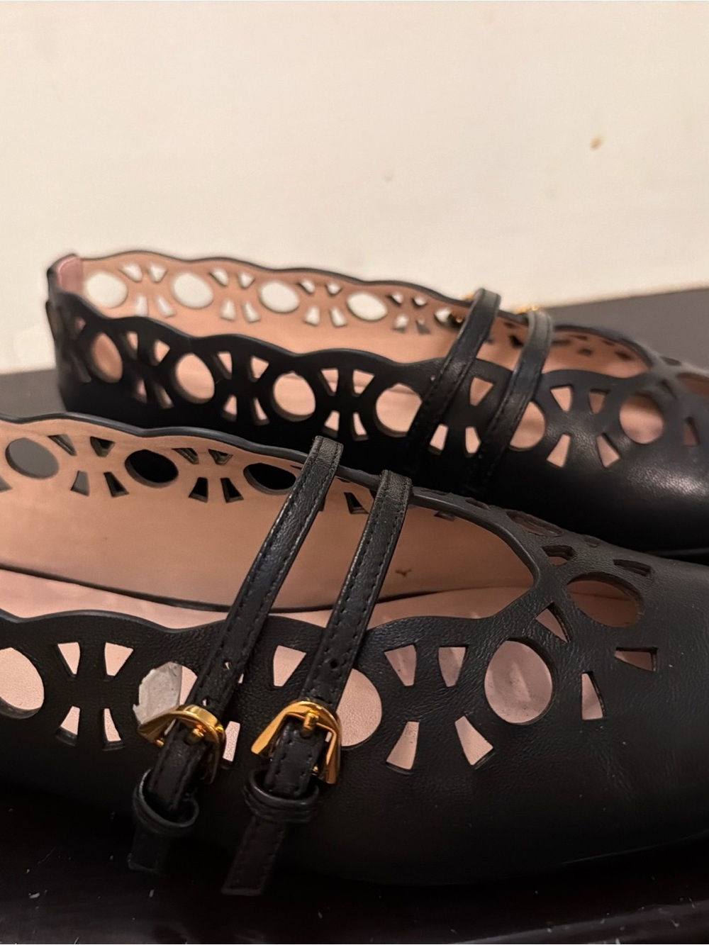 Black Laser-Cut Mary Jane Flats with Dual Straps and Gold Buckles